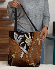 Peace love cure leather pattern print All-over Tote aos-all-over-tote-lifestyle-front-10