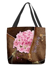 Never give up All-over Tote back