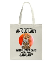 Never underestimate an old lady JANUARY Tote Bag tile