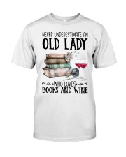 An old lady who loves books and wine Premium Fit Mens Tee tile