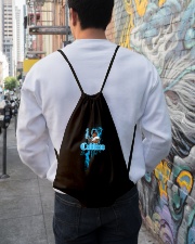 Cudlino Splattered Paint Logo Collection Drawstring Bag lifestyle-drawstringbag-front-1