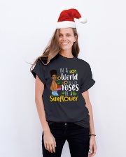 In a world full of roses be a sunflower Classic T-Shirt lifestyle-holiday-crewneck-front-1