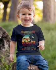 To Granddaughter - Granddaughter Knows Everything Youth T-Shirt lifestyle-youth-tshirt-front-4