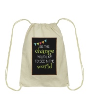 Be the change Drawstring Bag tile