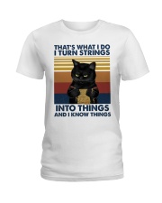 That's what I do I turn strings Ladies T-Shirt tile