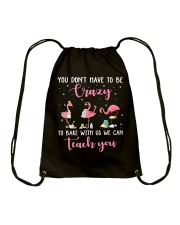 You Don't Have To Be Crazy Drawstring Bag tile
