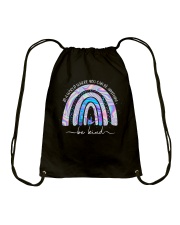 In A World Where You Can Be Anything Drawstring Bag tile