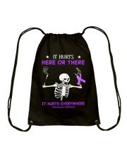 It Hurts Here Or There Drawstring Bag tile