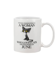 Never Underestimate A Woman 6 Mug tile