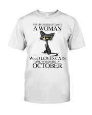 Never Underestimate A Woman 10 Premium Fit Mens Tee tile