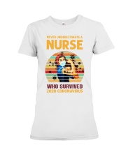 Never Underestimate A Nurse Premium Fit Ladies Tee tile