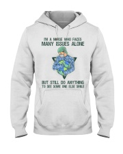 I'm A Nurse Who Faces Many Issues Alone Hooded Sweatshirt tile