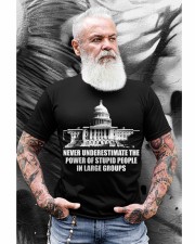 Never underestimate the power of stupid people in large groups Classic T-Shirt apparel-classic-tshirt-lifestyle-front-264