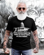Never underestimate the power of stupid people in large groups Classic T-Shirt apparel-classic-tshirt-lifestyle-front-268
