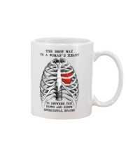The best way to a woman/'s heart.....mug white