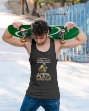 Behind Every Football Player is A Football Dad Unisex Tank apparel-tshirt-unisex-sleeveless-lifestyle-front-02