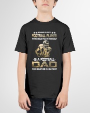 Behind Every Football Player is A Football Dad Youth T-Shirt garment-youth-tshirt-front-01