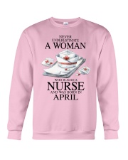 nurse a woman April Crewneck Sweatshirt tile