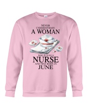 nurse a woman June Crewneck Sweatshirt tile