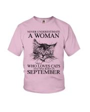 cats a woman September Youth T-Shirt tile