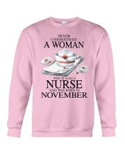 nurse a woman November Crewneck Sweatshirt tile