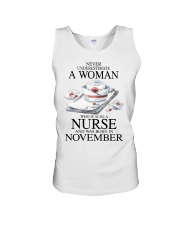 nurse a woman November Unisex Tank tile