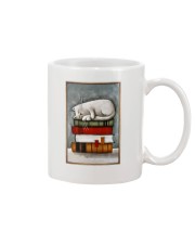 Cat on the books Mug tile
