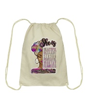 She is stronger than the storm Drawstring Bag tile
