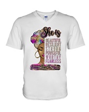 She is stronger than the storm V-Neck T-Shirt tile