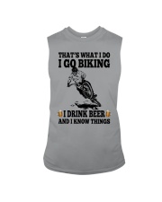 I go biking i drink beer - i know things Sleeveless Tee tile