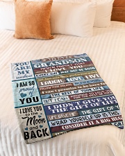 FOLLOW YOUR DREAMS - GRAMMY TO GRANDSON Small Fleece Blanket - 30" x 40" aos-coral-fleece-blanket-30x40-lifestyle-front-01