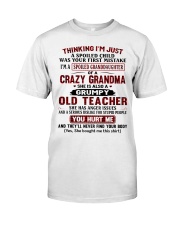 I'M A SPOILED GRANDDAUGHTER OF A CRAZY GRANDMA Premium Fit Mens Tee tile
