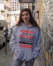 ASSUMING - PERFECT GIFT FOR TEACHER Hooded Sweatshirt lifestyle-unisex-hoodie-front-1
