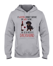 She Also Needs - Dachshund Hooded Sweatshirt front