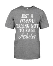 Just a mom trying not to raise assholes Premium Fit Mens Tee tile