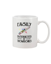 Easily distracted by Trombone Mug tile