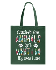 RESCUE CARING FOR ANIMAL Tote Bag tile