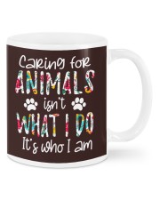 RESCUE CARING FOR ANIMAL Mugs tile