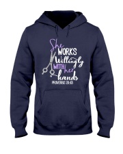 Hairstylist works willingly with her hands Hooded Sweatshirt tile