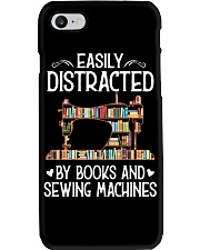 Easily distracted by books and sewing machines Phone Case tile