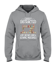 Easily distracted by books and sewing machines Hooded Sweatshirt tile