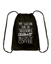 My salon runs on scissors laughter and coffee Drawstring Bag tile