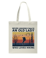 Never Underestimate An Old Lady Who Loves Hiking Tote Bag tile