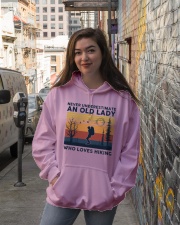 Never Underestimate An Old Lady Who Loves Hiking Hooded Sweatshirt lifestyle-unisex-hoodie-front-1