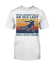 Never Underestimate An Old Lady Who Loves Skiing Premium Fit Mens Tee tile
