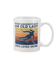 Never Underestimate An Old Lady Who Loves Skiing Mug tile