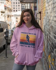 Underestimate Me That'll Be Fun - Hockey Hooded Sweatshirt lifestyle-unisex-hoodie-front-1