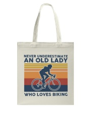Never Underestimate An Old Lady Who Loves Biking Tote Bag tile