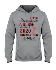 Never Underestimate A Nurse Who Survived 2020 Hooded Sweatshirt tile