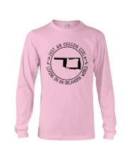 OREGON GIRL LIVING IN OKLAHOMA WORLD Long Sleeve Tee tile